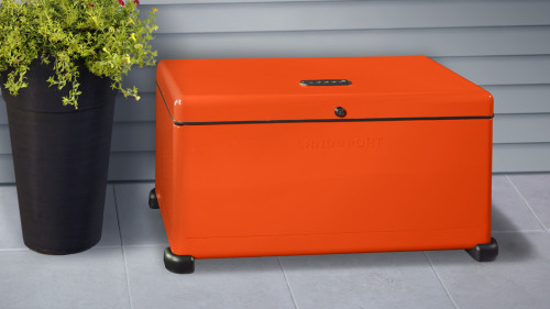 burnt orange colored outdoor lockbox for package protection against porch theft